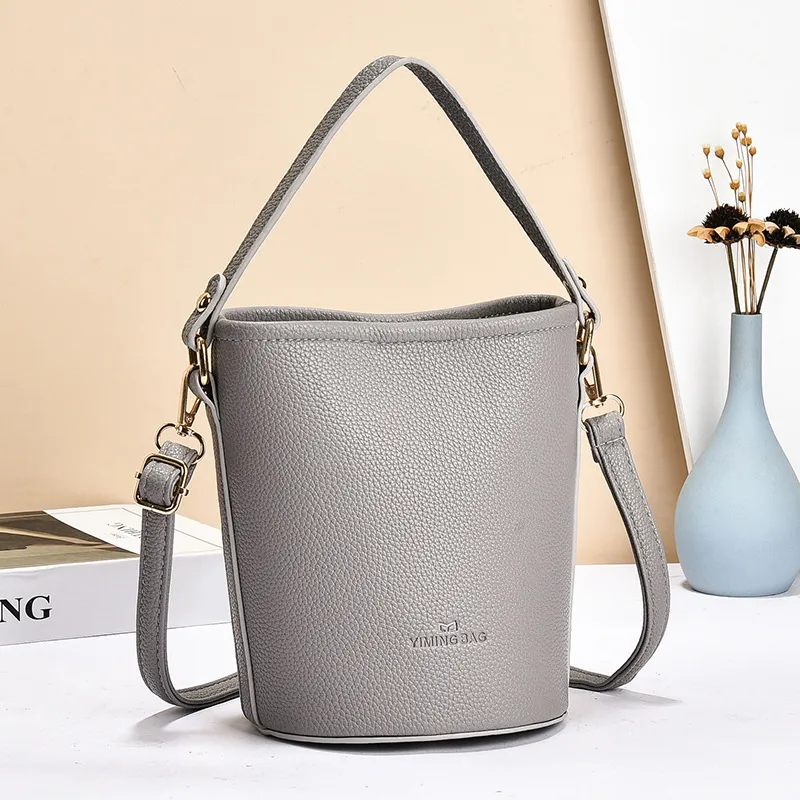 Women's PU Leather Bucket Bag Featuring Sewing Thread Details In Solid Color