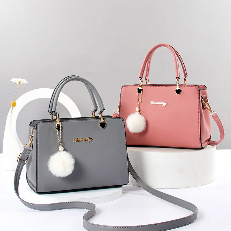 Fashion Large Solid Color Women Top Handle Bag In PU Leather With Fluff Ball And Zipper Closure