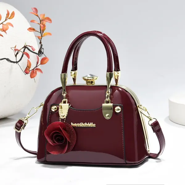Women’s Dome Bag In Patent Leather With Shell Shape And Sewing Thread Detail, Featuring Top Handle