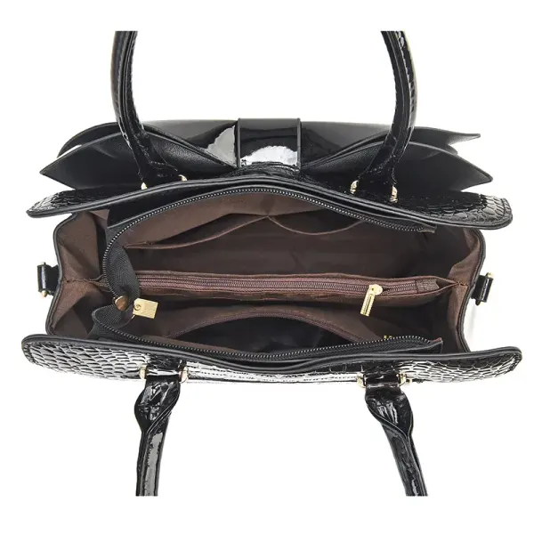 Top view of the Jet Black handbag; zippered main opening visible in image 3.
