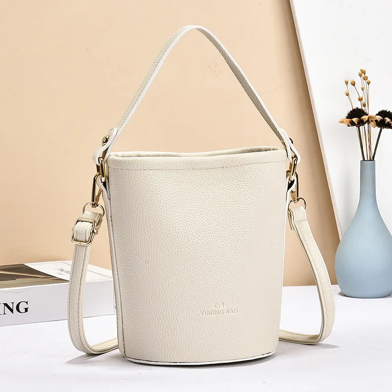 Women's PU Leather Bucket Bag Featuring Sewing Thread Details In Solid Color