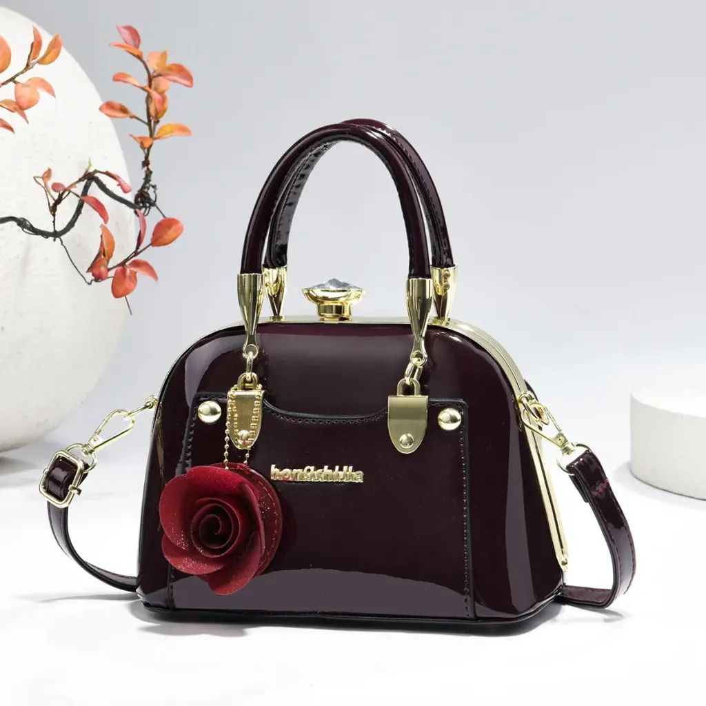 Women’s Dome Bag In Patent Leather With Shell Shape And Sewing Thread Detail, Featuring Top Handle