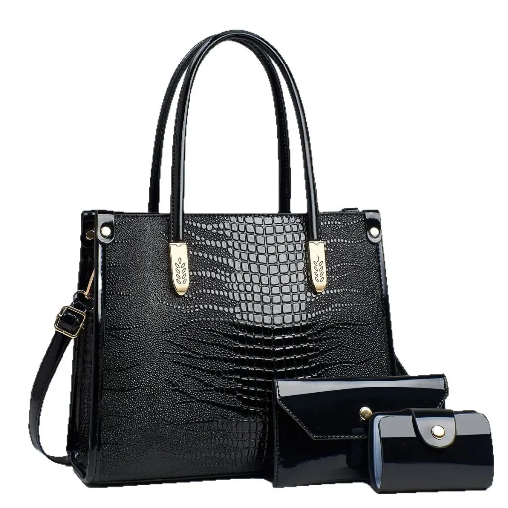 Jet Black croc-embossed tote with two handles, a long strap and two matching accessories