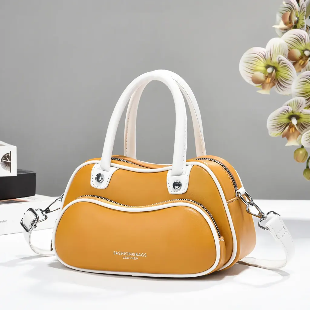 Women’s Color Block Boston Bag In PU Leather With Sewing Thread Detail, Pillow Shape Top Handle For Spring And Summer