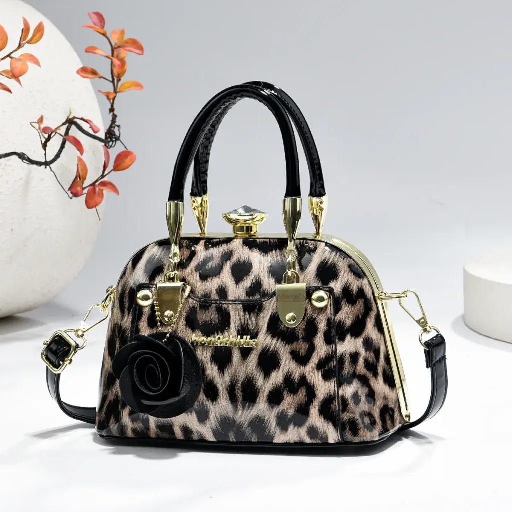 Women’s Dome Bag In Patent Leather With Shell Shape And Sewing Thread Detail, Featuring Top Handle