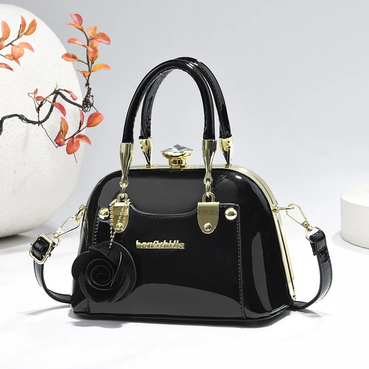Women’s Dome Bag In Patent Leather With Shell Shape And Sewing Thread Detail, Featuring Top Handle Main image